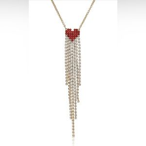 Lovely BCBGeneration gold pendant necklace with heart